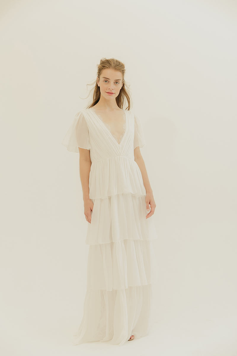 Silk chiffon dress with draped V neckline with soft chantilly scallop lace detail and tiered skirt