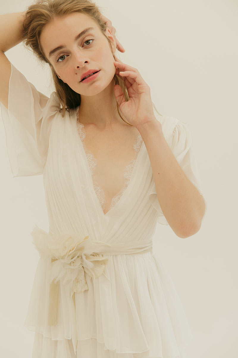 Silk chiffon dress with draped V neckline with soft chantilly scallop lace detail and tiered skirt