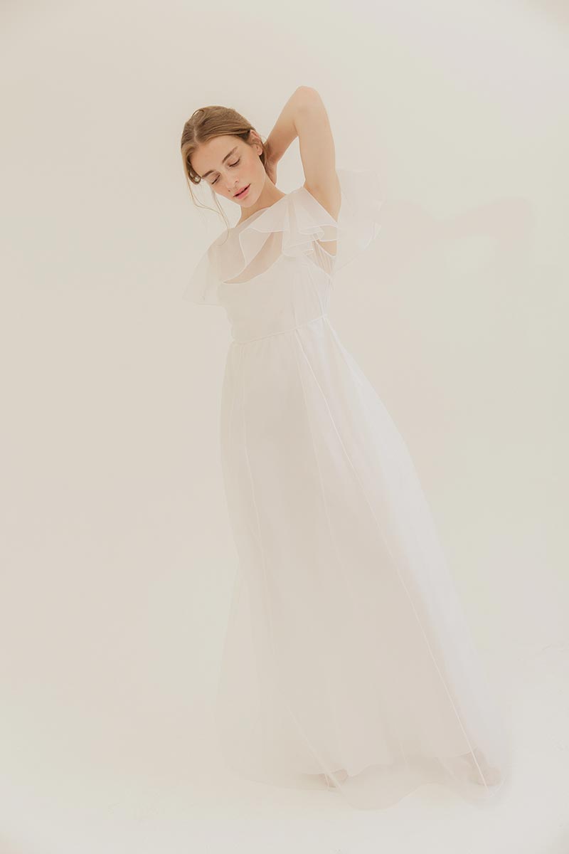 Sheer silk organza dress with romantic flutter neckline and short silk slip